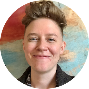 A headshot of Caley Burton, technical writing manager and documentation expert